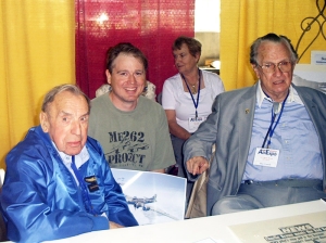 is_photo__was_taken_at_the_Wings_of_the_North_Airshow_in_July_2004.__Franz_Stigler_is_on_the_left__Charles_Brown_right__Artist_Jamie_Iverson_center.[1]